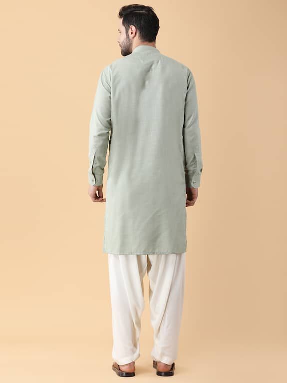 Mint green bundi crafted in ruby cotton silk with all over spring fleur print. Paired with a plain cotton silk kurta and cotton rayon salwar pant. - Aza Fashions Cotton Nehru Jacket With Long Sleeves For Eid, Long Sleeve Cotton Nehru Jacket For Eid, Cotton Nehru Jacket With Dabka And Long Sleeves, Cotton Lawn Suit With Dabka In Pista Green, Pista Green Cotton Lawn Suit With Dabka Details, Pista Green Cotton Lawn Suit With Dabka, Designer Cotton Sherwani With Naqshi Detail, Unstitched Green Cotton Sherwani, Designer Cotton Sherwani With Naqshi