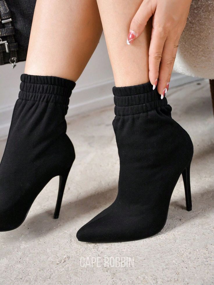 Step into brunch with impeccable style with the Nauvoo ankle booties. These fashionable booties feature a trendy heel, an elastic band for a comfortable fit, and a sleek pointy toe. Turn heads as you confidently make your way to your table.Nauvoo Pointy Toe High Heel Ankle Booties Black         Women Shoes, size features are:Bust: ,Length: ,Sleeve Length: Fitted Pointed Toe Booties With Padded Ankle, Fitted Booties With Padded Ankle And Pointed Toe, Chic Winter Booties With Padded Ankle, Trendy Stretch Boots For Night Out, Chic Winter Booties For Night Out, Chic Fall Booties With Padded Ankle, Trendy Fitted Booties For Night Out, Trendy Fitted Pointed Toe Booties, Winter Fitted Booties With Padded Ankle