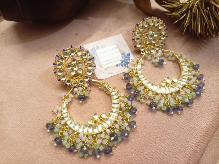 Party wear Chandbali earrings. Order yours now. VeroniQ Trends(+91-9549901009) is a Leading manufacturer of Kundan,Polki Jewelry& Garments in India. We make any jewelry on order. Almost all designs on our page can be made anytime on order. To order click on the link www.veroniqtrends.com or message. For international buyers or drop a message (What’s App) (+91-9549901009)(India)or Drop a Mail at info@veroniqtrends.com (Indian jewellery, VeroniQ Trends, long necklace, choker necklace, silv... Chandbali Earrings, Polki Jewellery, Indian Culture, Onyx Bead, Pink Beads, Jewelry Wedding, Sapphire Blue, Indian Jewellery, Blue Beads