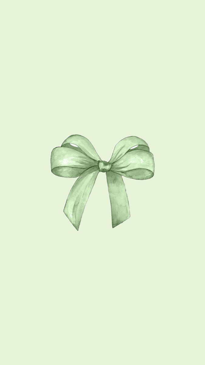 a green bow on a light green background