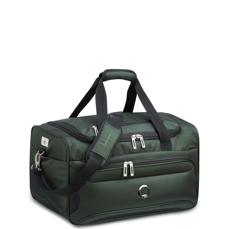 A versatile duffel carry-on with well-designed organization and a roomy packing compartment to hold enough clothing for a two-day trip. Carry it by hand, over the shoulder, or slide it over the tubes of rolling luggage when traveling with several pieces of luggage thanks to its integrated smart band. Durable Fabric: Constructed of durable polyester fabric, with an elegant twill pattern Light, versatile, and easy to squeeze into cramped compartments 5 Exterior Pockets: Well-designed organization Twill Pattern, Carry On Size, Cabin Luggage, Tie Down Straps, Beauty Case, Smart Band, Luggage Sets, Metallic Blue, Carry On Luggage