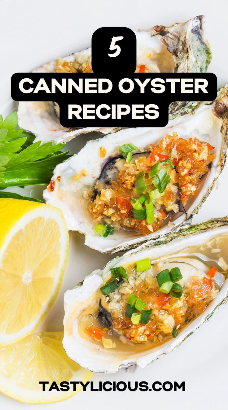 three oysters on a plate with lemon wedges and parsley garnish