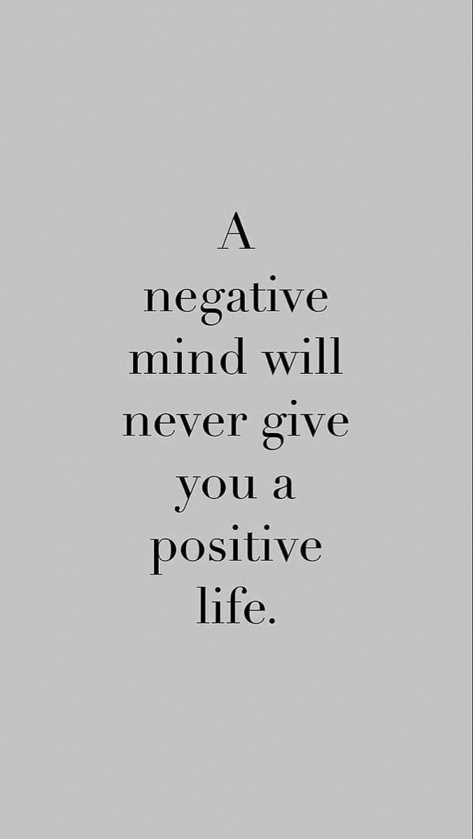 a negative mind will never give you a positive life quote on grey background with black and white lettering