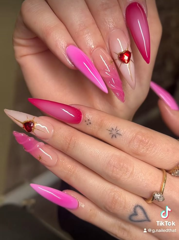 Stilleto Aura Nails, Girly Nail Designs Pink, Pink Aura Nails With Gems, Valentine’s Day Nails Stiletto, Air Brush Nail Designs Ideas, Colorful Stiletto Nails, Red And Pink Nails Ideas, Valentines Nails Almond Shape, Purple Nail Looks