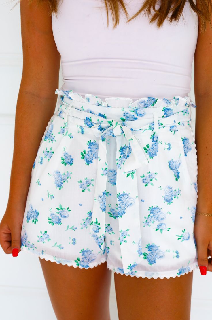 blue floral shorts ruffle waste tie waste side zipper scallop detail on the bottom Sorority Dresses, Floral Shorts, New Arrival Dress, Gift Accessories, Holiday Collection, Blue Floral, Side Zipper, Denim Skirt, Rompers