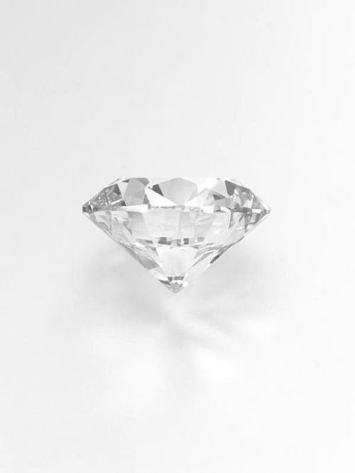 a diamond on a white background with no one in the photo to describe it's origin