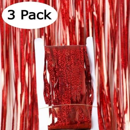 three packages of red glitter sitting on top of a white chair