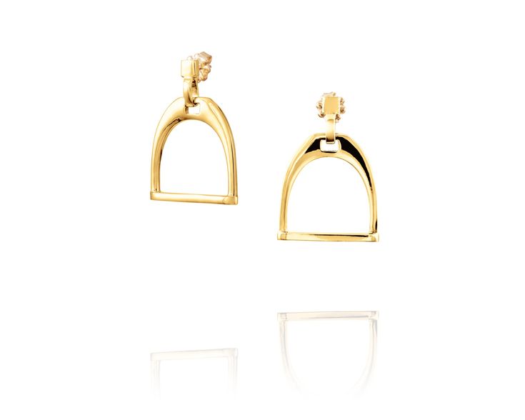 Channel your inner equestrian with the Vincent Peach Equestrian Stirrup Earrings, a captivating design that celebrates the beauty and grace of horses. These exquisite earrings, crafted from gleaming sterling silver or luxurious 14k yellow gold, feature intricately detailed stirrup silhouettes. Measuring 1.5 inches tall and 1 inch wide, these statement earrings add a touch of equestrian flair to any outfit. Unveiling Exquisite Details: Equestrian-Inspired Design: The stirrup silhouette is a timel Peach Jewelry, Diamonds And Pearls, Equestrian Jewelry, Stirrups, Black Rhodium, Equestrian Style, Jewelry Creation, Casual Elegance, Leather Jewelry