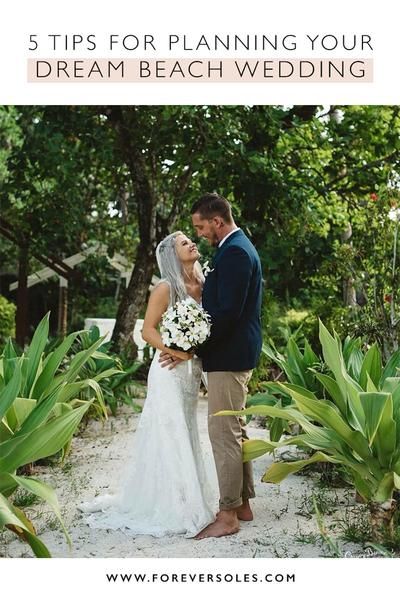 a bride and groom standing in front of trees with the words 5 tips for planning your dream beach wedding