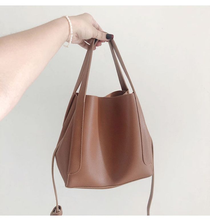 Buy Online Leather Bucket Bag with Shoulder Strap and Inner Pouch Trendy Brown Bucket Bag, Brown Large Capacity Bucket Bag, Faux Leather Bucket Bag With Double Handle, Brown Bucket Hobo Bag For Daily Use, Large Capacity Faux Leather Bucket Bag, Faux Leather Bucket Hobo Bag, Solid Color Bucket Hobo Bag For Office, Brown Bucket-shaped Hobo Bag, Brown Bucket Bag With Detachable Handle