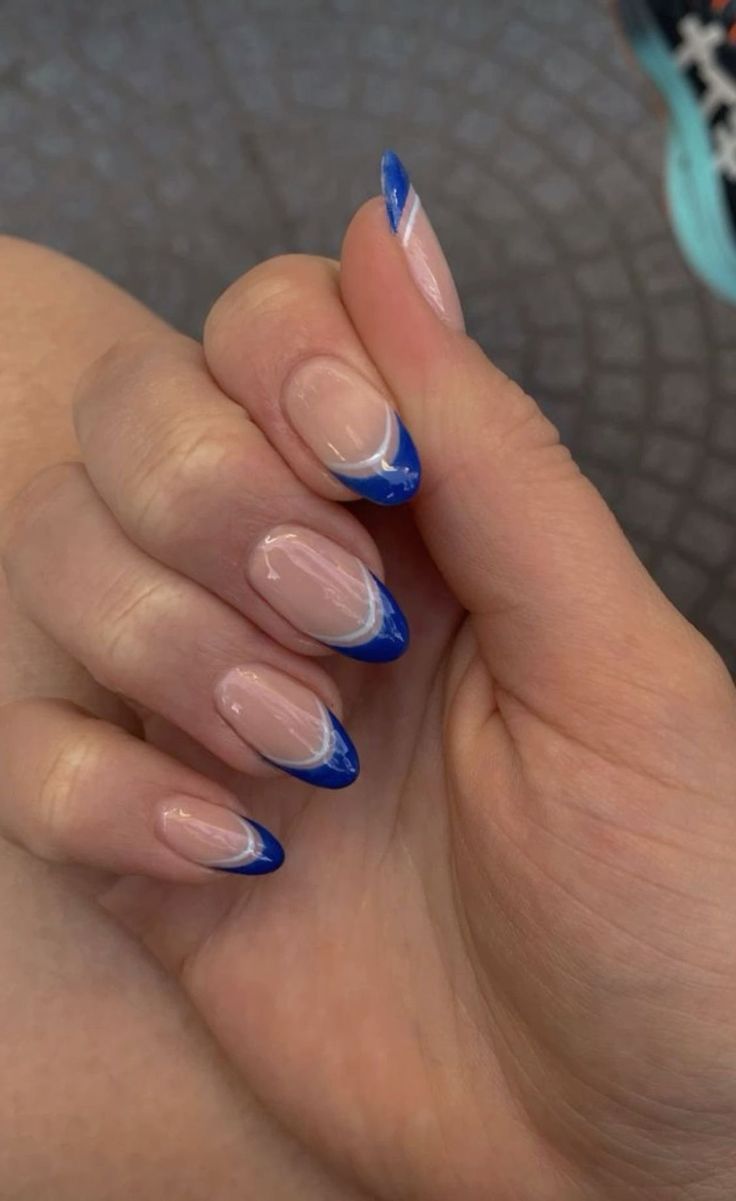 There's a new beauty trend taking over Instagram and it's absolutely stunning. Say hello to "quartz nails". Cute Nails With Blue Dress, Dark Blue And White French Tip Nails, Dip Tips Nails Ideas, Homecoming Nail Ideas Simple, Megan Moroney Nail Ideas, Blue French Tip Nails With White Line, Formal Blue Nails, Light And Dark Blue French Tip Nails, Greece Aesthetic Nails