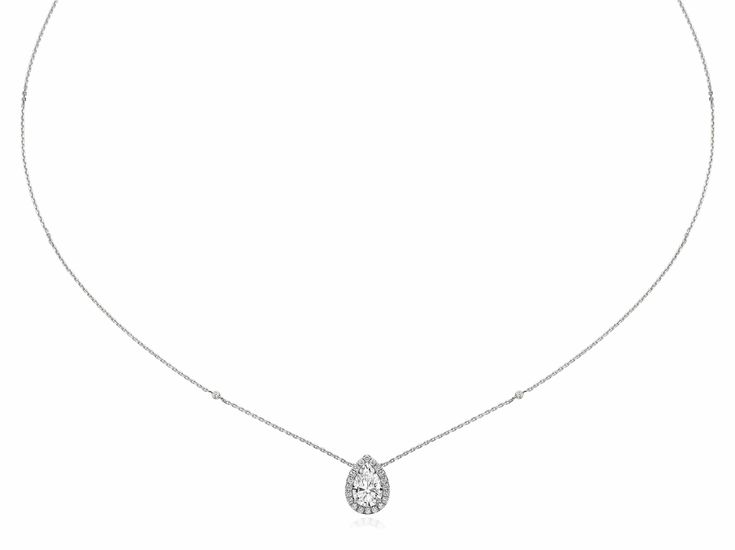 This exceptionally beautiful 1.20 ct diamond pendant gives you an exceptional combination of size, brilliance, and beauty. You can dress it up or dress it down. It has such an elegant design. The 1 ct pear cut diamond poised in the center is appraised at F-I1, colorless and eye clean. The diamond is accented by a halo of round diamonds set around it in a micropave setting. It is mesmerizing! Pear Shaped Diamond Necklace, Diamond Necklace Pendant, Pear Pendant, Round Diamond Setting, Pear Cut Diamond, Marquise Cut Diamond, Oval Cut Diamond, Pear Shaped Diamond, Eternity Band Diamond