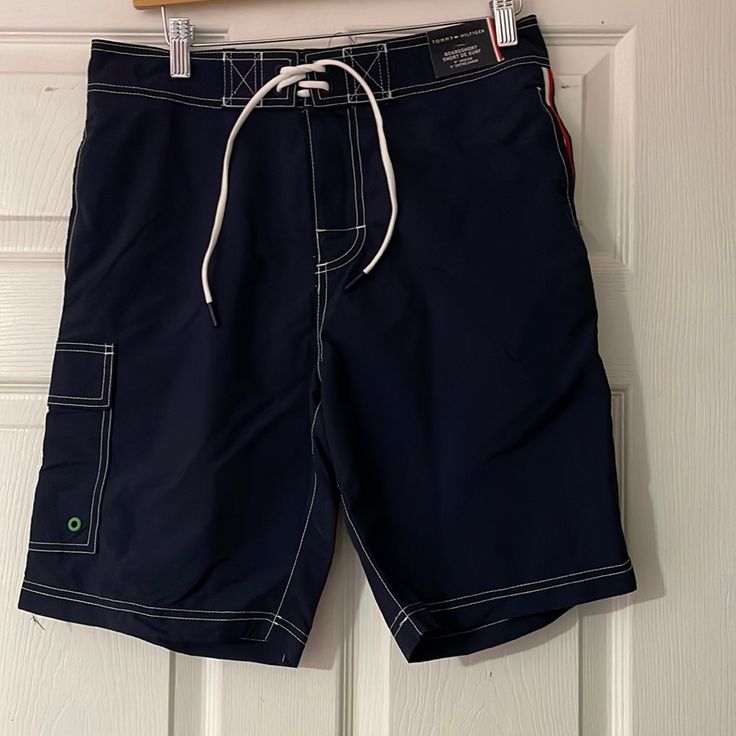 Xs/ M Nautica Navy Blue Swimsuit For A Boy Navy Swimwear With Pockets For Summer, Blue Sports Swimwear With Pockets, Blue Sports Swimwear With Side Pockets, Casual Blue Swim Trunks With Side Pockets, Casual Blue Swimwear, Navy Swim Shorts With Pockets, Navy Swimwear With Pockets, Navy Short Swimwear With Pockets, Casual Blue Nylon Swimwear