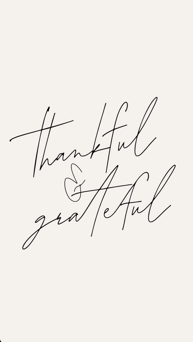 the words thank and grateful are written in cursive handwriting on a white background