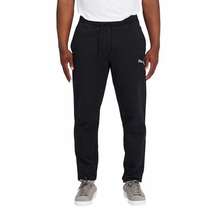 Puma Men's Training Pant Dual Side Pockets Comfort Waistband With Drawstring Lightweight Stretchlite Fabric Regular Fit Mesh Overlay Side Panels Puma Cat Logo On Left Leg Inseam (In): S = 31 | M = 31.5 | L = 32 | Xl = 32.5 | Xxl =33 67% Cotton/26% Polyester/ 7% Spandex Men's Outfit By Occasions, Puma Pants, Sweat Pant, Puma Cat, Cat Logo, Training Pants, Mesh Overlay, Puma Mens, Active Wear Pants