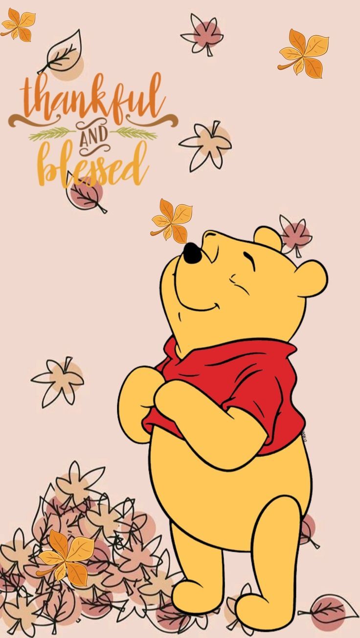 a winnie the pooh character with flowers in front of it and an inscription that says,