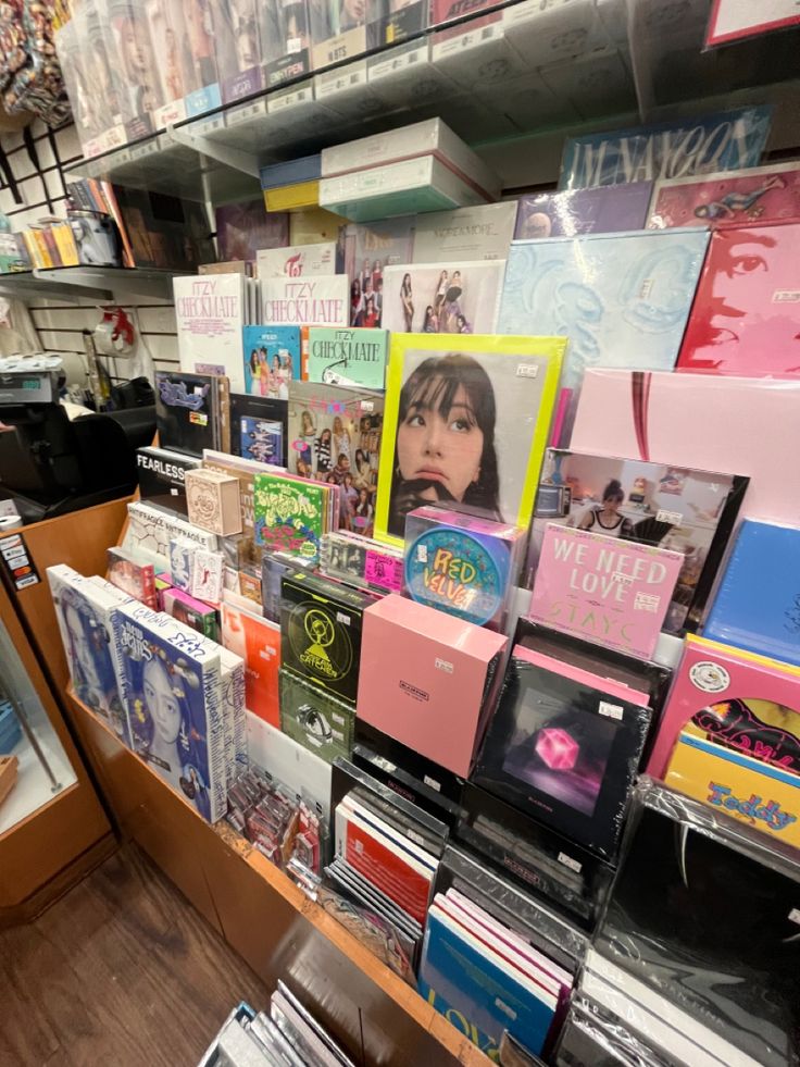 there are many cd's on display in the store and one is for sale