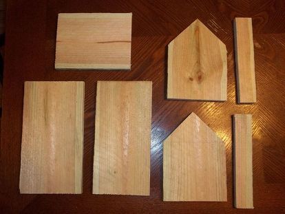 several pieces of wood laid out on a table