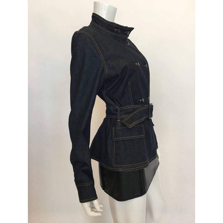 Description: Yves Saint Laurent dark blue denim jacket Double-breasted Mandarin collar Button detailing Two front patch pockets Belted Shoulder to shoulder: 17" Sleeves: 26" Underarm to underarm: 40" Waist: 34" Total length: 22" Circa 1990's Details: Size: Approx. M/L Color: Dark BlueMaterial: 98% Cotton, 2% Spandex Condition: Excellent Brand: Yves Saint Laurent Shipping: Standard: $9.95Expedited: $19.95 Designer Blue Denim Jacket With Pockets, Designer Long Sleeve Denim Jacket For Work, Fitted Utility Jacket With Patch Pockets, Designer Denim Outerwear With Pockets, Fitted Blue Denim Jacket With Flap Pockets, Fitted Denim Jacket With Flap Pockets For Work, Denim Outerwear With Multiple Pockets For Work, Spring Fitted Utility Jacket With Multiple Pockets, Spring Utility Jacket With Multiple Pockets