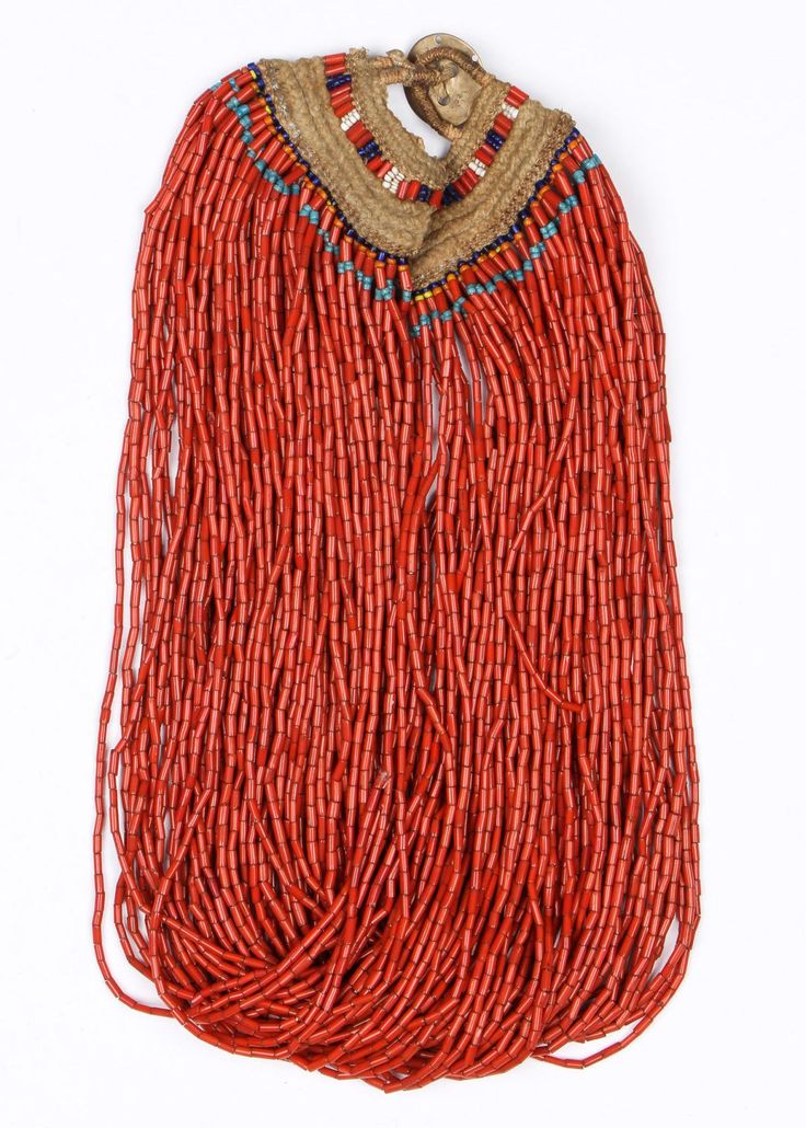 "Authentic Konyak Naga Red Glass Bead Necklace, Ca Early 1900\"s, # 1481 Description: # 1481 Red Glass Bead Naga Necklace. 71-strands of old, uniform red glass trade beads in an authentic, original necklace, worn by Konyak tribe Naga people in the northwest hills of Burma throughout the past few centuries. Beads possibly of Indian manufacture in the mid-1900's. Condition: Very good condition, with tightly woven beaded macrame. Dimensions: Size: 24'' x 2.5'' (51 x 6 cm). Nagaland has a rich diver Traditional Red Coral Beaded Necklace With Colorful Beads, Traditional Red Coral Beads, Vintage Red Hand-strung Beaded Necklaces, Traditional Red Beads With Bead Caps, Traditional Beaded Necklaces With Round Beads, Traditional Hand-strung Red Coral Beads, Traditional Beaded Necklaces With Bead Caps, Traditional Red Coral Hand-strung Beads, Artisan Red Beaded Necklace