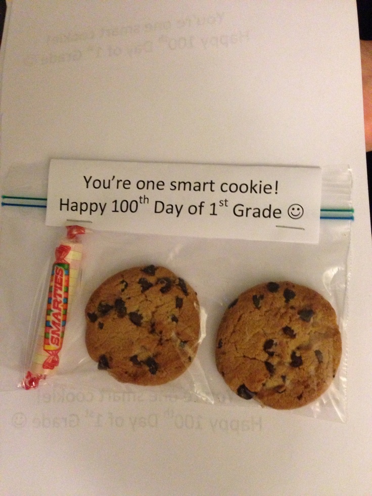 two chocolate chip cookies in a package with a candy bar on the side that says, you're one smart cookie happy 100th day of 1st grade