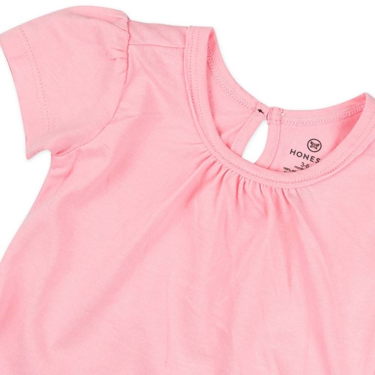 An essential for all babies, Honest Baby Clothing Short Sleeve T-Shirts will keep your little one cool and comfy all day long. Our basic tees are not-so-basic. Our short sleeve tee is made from machine washable, super soft 100% certified organic cotton and features puff sleeves and a crew-neck neckline for easy changing and dressing. Perfect for wearing on their own or layering for a super cute look, these short sleeve t-shirts for babies are great all year long. Your little one is sure to look Soft-washed Pink Top For Spring, Pink Short Sleeve T-shirt For Playtime, Cute Solid Short Sleeve Tops, Playful Soft-washed Tops For Playtime, Soft-washed Crew Neck Tops For Playtime, Soft-washed Cotton Tops For Playwear, Cute Soft-washed Pink Top, Cute Pink Soft-washed Tops, Cute Pink Tops For Playwear