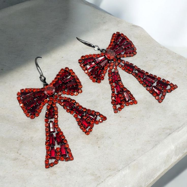 Only One In Stock. Gunmetal Tone Metal. Cz Stones. Hook On Earrings Lightweight Bow Earrings, Red Bow, Earrings Color, Cz Stone, Jewelry Earrings, Women Jewelry, Stone, Grey, Red