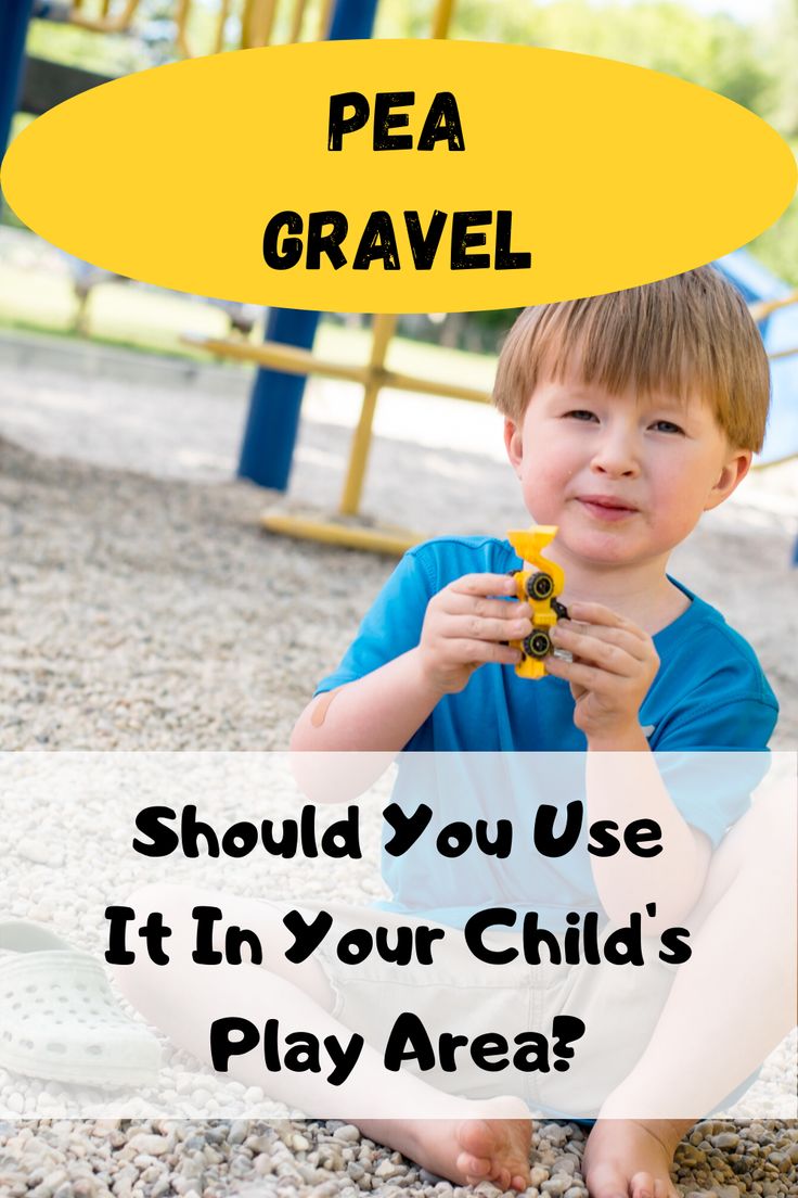 a young boy sitting on the ground with a toy in his hand and text overlay that reads pea gravel should you use it in your child's play area?