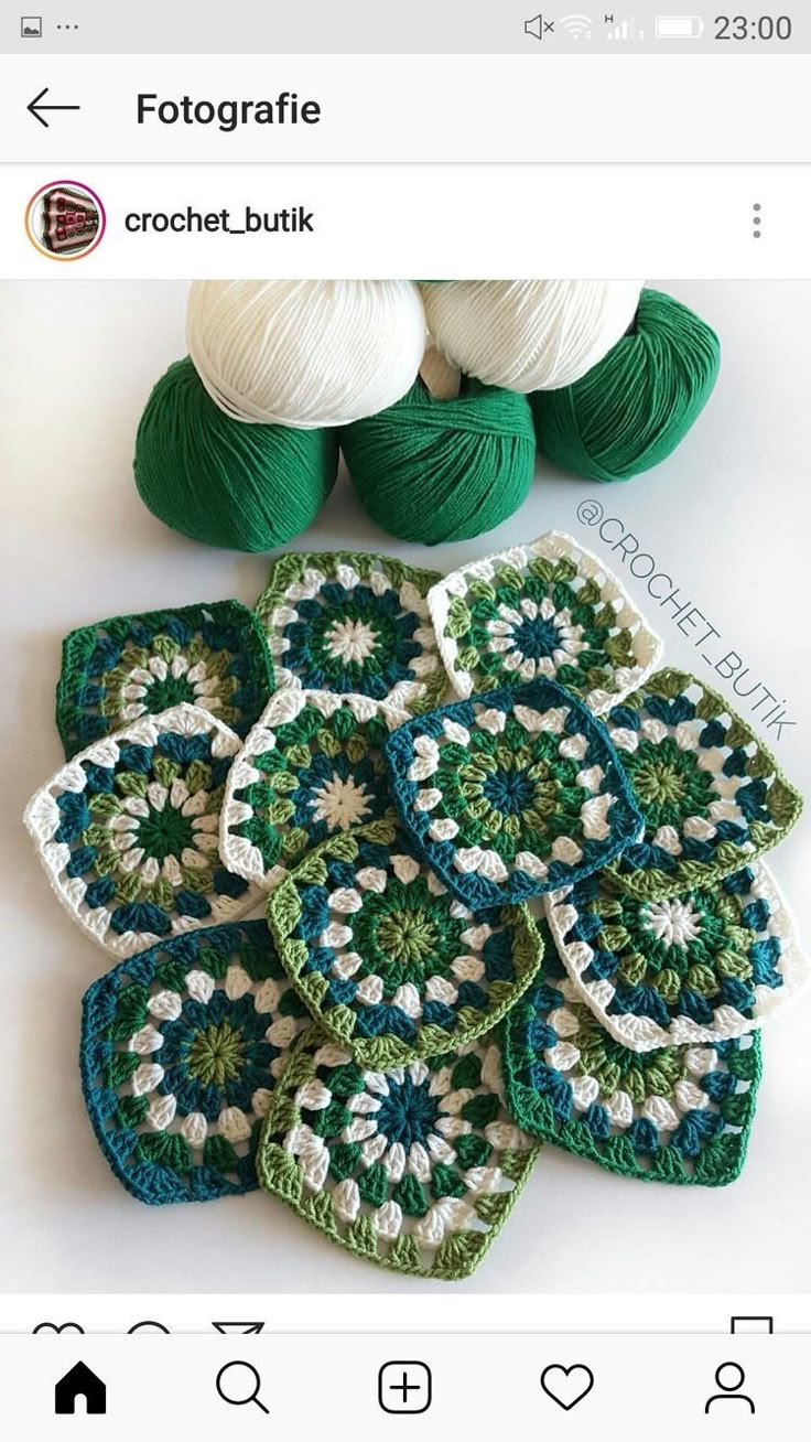 green and white crocheted coasters with balls of yarn