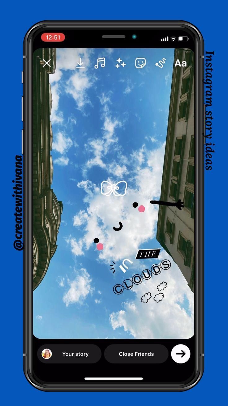 an iphone screen with the sky and clouds in the background, as seen from below