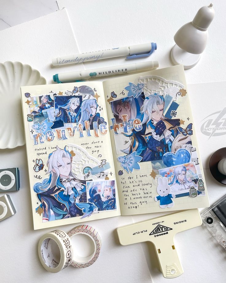 an open book with anime characters on it next to some tape, scissors and other items