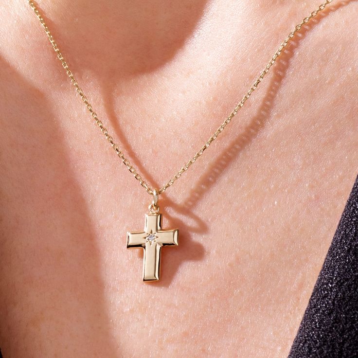 14k Solid Gold Cross Pendant 14k Solid Gold Minimalist & Tiny Design Religious Cross Charm Pendant Necklace for Women with Color Options. Wear it alone or stack with other necklaces to have timeless and completed everyday look.   Pendant Details  ❥ Gold KT: 14k Solid Gold   ❥ Gold Color Options: Yellow Gold, White Gold, Rose Gold  ❥ Pendant: 15.60x10.30 mm  ❥ Thickness: 1.32 mm  ❥ AAA Grade White Cubic Zirconia  ❥ It can be used with up to 3 mm chains. If you are to use it with a thicker chain, Yellow Gold Cross Necklace For First Communion, Yellow Gold Cross Pendant Necklace For First Communion, Yellow Gold Cross Pendant For First Communion, Yellow Gold Cross Necklaces For Baptism, 14k Gold Cross Pendant Necklace For First Communion, Yellow Gold Cross Pendant For Baptism, Yellow Gold Crucifix Jewelry For First Communion, Yellow Gold Baptism Cross Pendant Jewelry, Classic Crucifix Jewelry For First Communion