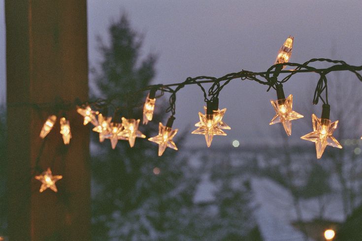 some lights that are hanging from a wire