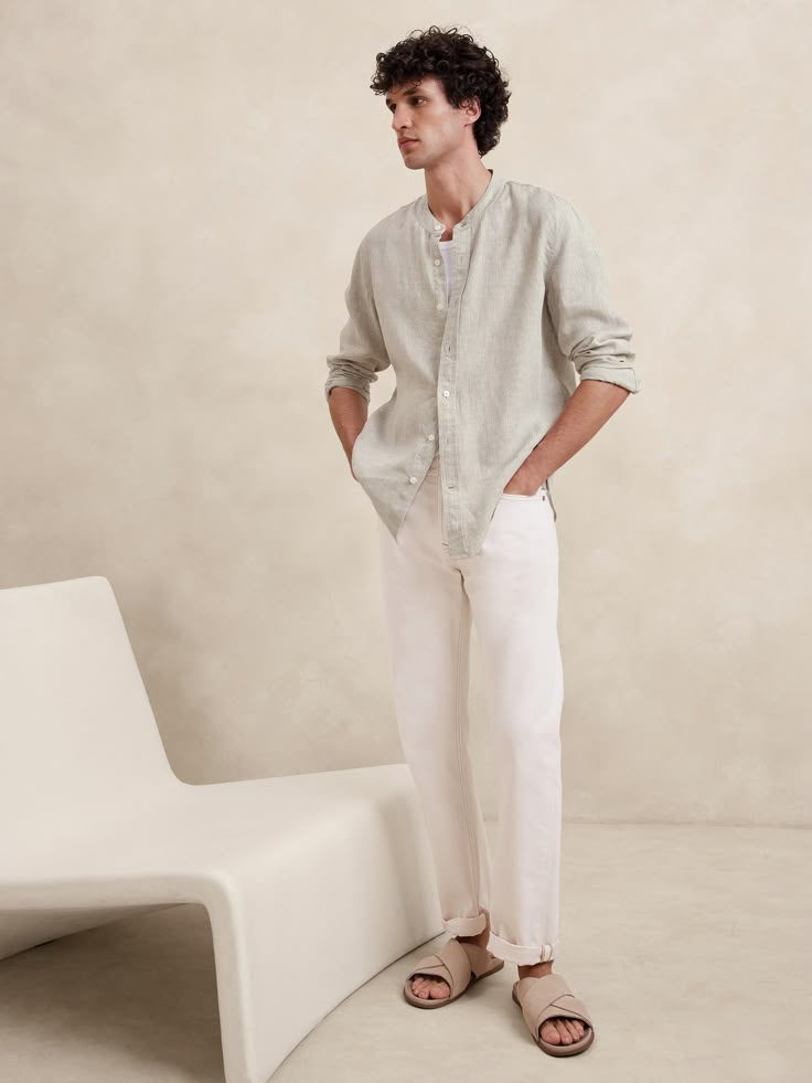 Cut from our signature 100% linen, we love this shirt for its beautiful, natural texture and ability to stay cool and crisp, even in heat and humidity.  Standard fit.  Banded collar and button front.  Shirttail hem.  Standard fit.  Long sleeves.  Hip length.  Model: Size M, 6'2" (188cm). Linen Men Style, Linen Outfit Photoshoot, Mens Beach Photoshoot Outfit, Linen White Shirt Men, Beige Summer Outfit Men, White Linen Shirt Men Outfit, Mexican Guy Outfits, Mens Linen Shirt Outfit, Male Beach Outfit