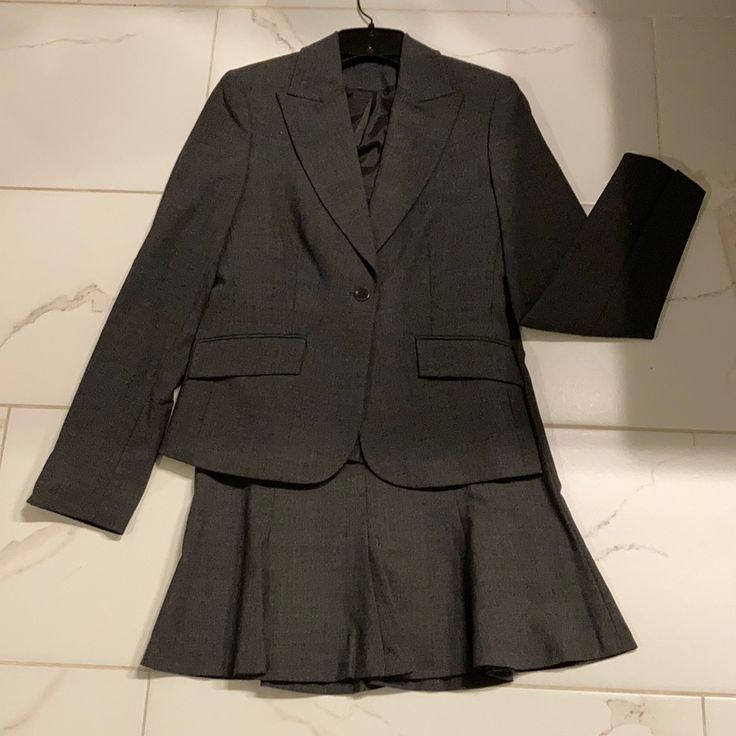 Women’s Skirt Suit- Looks Brand New! Front Single Front Button Inside Is Lined Abs Has Flattering Waistline Skirt Is Zip Up Back Pencil Then Pleated Flare At Bottom Professional Yet Flattering! No Tears, Rips And Comes From Smoke/Pet-Free Home Single Breasted Fitted Skirt Suit For Business Casual, Fitted Single Breasted Skirt Suit For Business Casual, Fitted Single-breasted Skirt Suit For Business Casual, Fitted Single Breasted Skirt Suit For Office Wear, Fitted Single Breasted Skirt Suit For Work, Fitted Single-breasted Skirt Suit For Office Wear, Fitted Single-breasted Skirt Suit For Work, Fitted Skirt Suit With Pockets For Office, Tailored Single-breasted Office Lady Skirt Suit