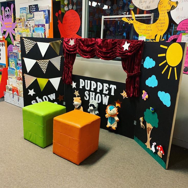 an assortment of children's art and crafts displayed in a classroom