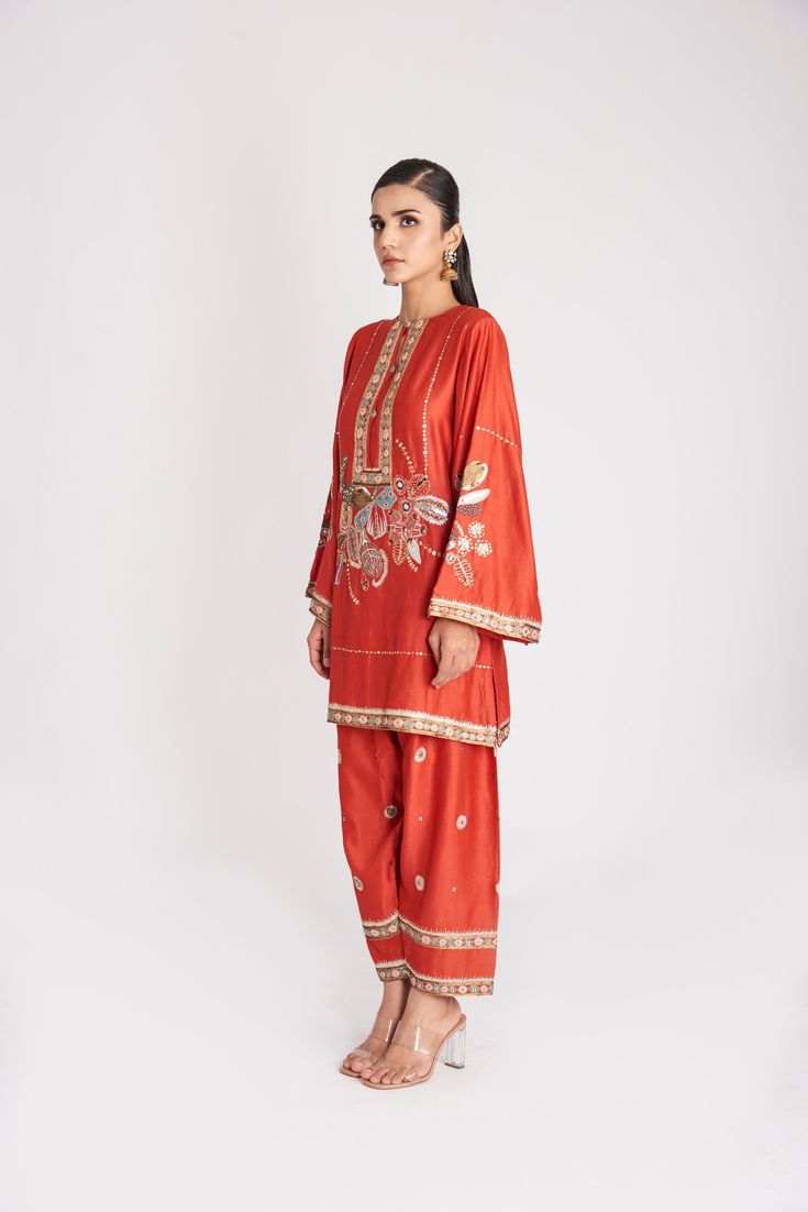 Kinfolk red applique embellished chanderi patiala kurta, pant and organza dupattaFrom Aisha Rao's Kinfolk collection. DELIVERY TIMEPlease allow 6-8 weeks for your outfit to arrive. FABRIC DETAILSChanderi, Organza Professional cleaning only. Red Silk Lawn Suit With Dabka, Red Chanderi Lawn Suit With Dabka, Red Chanderi Lawn Suit With Dabka Detail, Red Silk Lawn Suit For Eid, Red Silk Lawn Suit With Chikankari Embroidery, Red Cotton Silk Unstitched Suit For Eid, Red Silk Lawn Suit With Traditional Drape, Red Chanderi Palazzo Set With Dabka Detail, Red Chanderi Lawn Suit With Traditional Drape