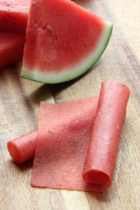 slices of watermelon on a wooden cutting board