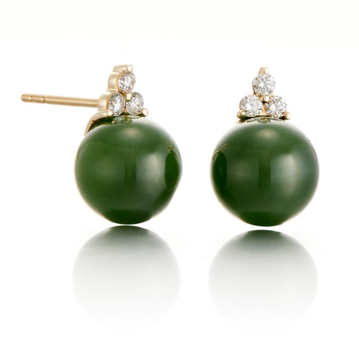 Creating a harmonious blend of timeless beauty and modern-day sophistication, these yellow gold earrings pair rich green nephrite jade beads with shimmering diamonds. Since 1861, Gump's has been a destination for jewelry that is distinctive and timeless. To ensure each piece is created to our exacting standards, our expert in-house jewelry team oversees every step of the production process. The result is a statement of pure elegance. Green nephrite jade, 10mm. Diamonds, 0.20ctw. 14-karat yellow Luxury Green Pearl Earrings, Elegant Style, Luxury Green Pearl Earrings Elegant, Luxury Green Pearl Earrings Elegant Style, Luxury Green Pearl Earrings Fine Jewelry, Luxury Green Pearl Earrings For Festive Occasions, Luxury Green Pearl Earrings For Party, Luxury Green Pearl Drop Earrings, Luxury Green Pearl Earrings, Luxury Traditional Green Pearl Earrings