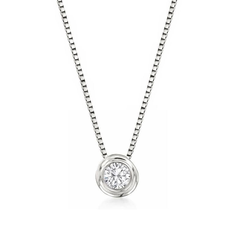 Ross-Simons - .12 Carat Bezel-Set Diamond Necklace in 14kt White Gold. 18". A stunning addition to any collection! A wonderfully pretty .12 carat bezel-set round brilliant-cut diamond is gloriously set in polished 14kt white gold. Suspends from a box chain. Springring clasp, bezel-set diamond necklace. Diamond birthstones are the perfect gift for April birthdays. Platinum Diamond Necklace With Single Diamond, White Gold Necklace With Bezel Setting And Round Cut, Anniversary Solitaire Necklace With Bezel Setting, Classic Diamond White Necklace With Bezel Setting, Sterling Silver Bezel Setting Round Cut Diamond Necklace, White Gold Round Solitaire Necklace, Diamond White Necklace With Round Bezel Setting, Diamond White Necklace With Bezel Setting And Round Shape, Diamond White Necklace With Bezel Setting Round