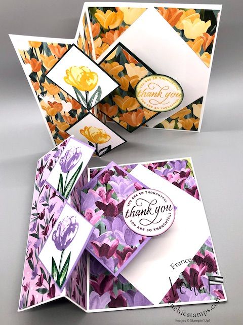 an open greeting card with flowers on it