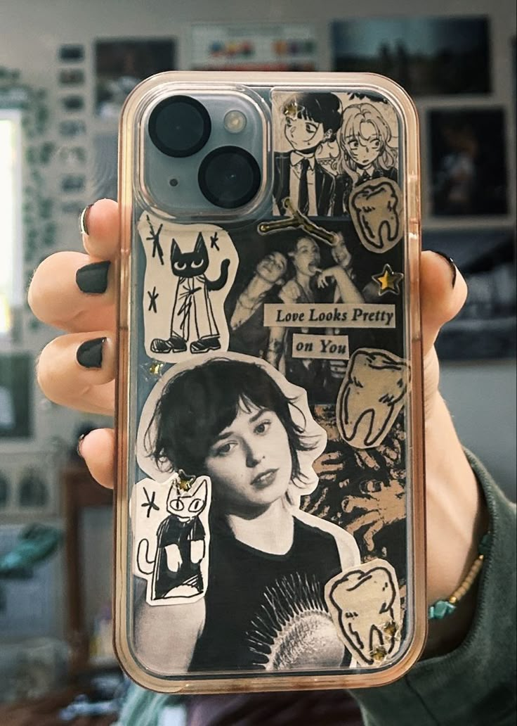 someone is holding up their phone case with some stickers on it and an image of the same person