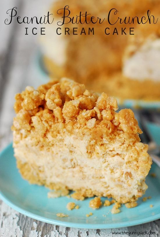 a piece of peanut butter crunch ice cream cake on a blue plate