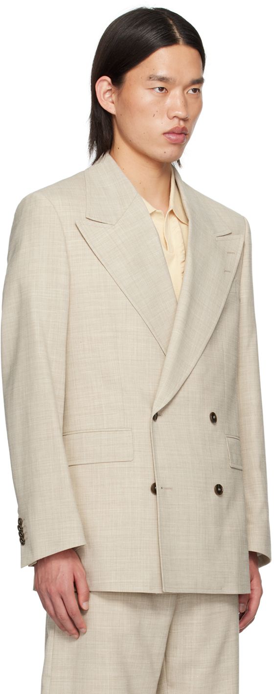 Slub stretch recycled polyester- and wool-blend canvas blazer. · Peaked lapel · Double-breasted button closure · Welt pocket and flap pockets · Padded shoulders · Four-button surgeon's cuffs · Twin vents at back hem · Welt pockets at interior · Full viscose satin lining Supplier color: Dry sand Double Blazer, Beige Suits, Dry Sand, Tuxedo Suit, Tiger Of Sweden, Tailored Jacket, Wool Blazer, Blazer Coat, Double Breasted Suit Jacket