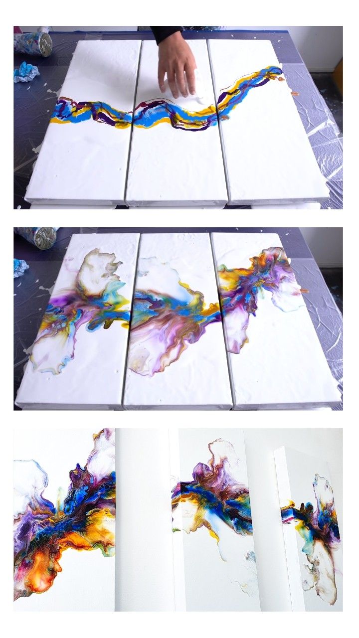 the process of painting on canvass with different colors and shapes, including one being painted