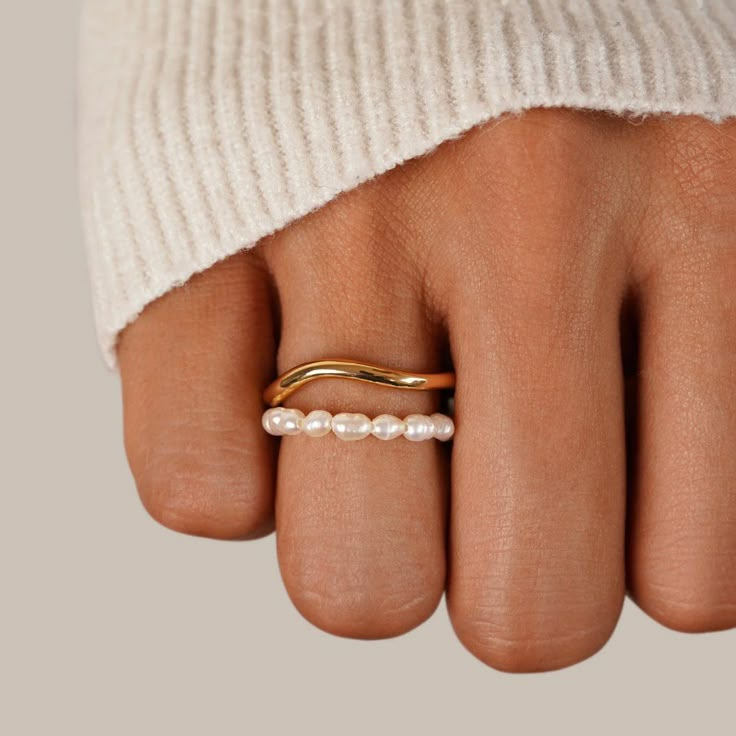 Keep it elegant & sleek with this Orelia Pearl Double Layer Ring. Wear alone or stack with other minimalist rings for that effortless look.  18K gold plated, copper Freshwater pearl Hypoallergenic, lead & nickel free  US/Canada Ring Size UK/AU Ring Size Inside Diameter (mm) 6 L 16.6mm 7 N 17.2mm 8 P 18.1mm  If Silversmithing Jewelry, Layered Rings, Shine Bright Like A Diamond, Gold Ring Stack, Minimalist Rings, Dainty Ring, Pearl Ring, High Quality Jewelry, Minimalist Jewelry