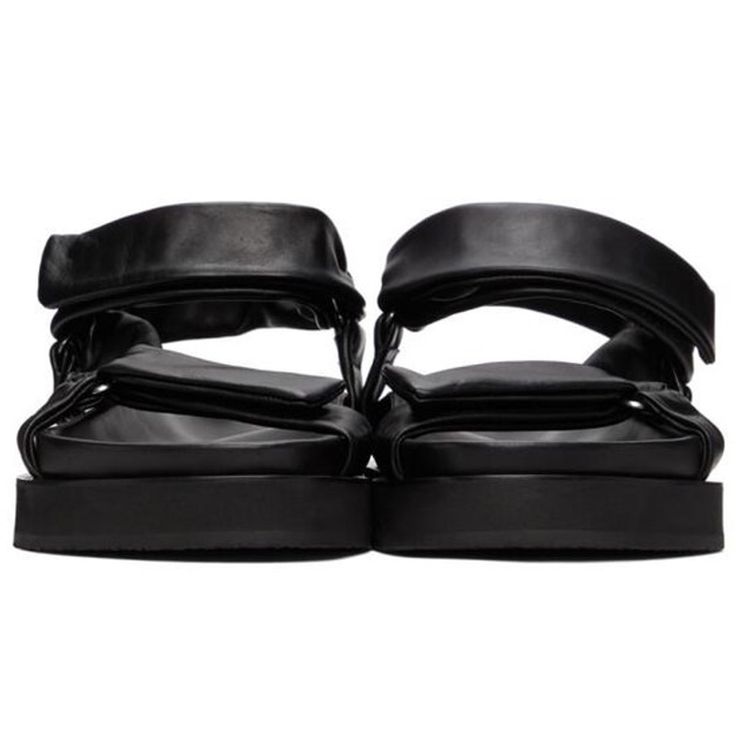 Jill Sander Black Sheepskin Sandals. Grained Nappa Sheepskin Sandals In Black. Butter Soft, Luxurious Leather. Open Round Toe. Adjustable Velcro Straps At Vamp And Ankle. Textile Logo Patch At Tonal Molded Leather Footbed. Tonal Treaded Rubber Sole. Silver-Tone Hardware. Black Calf Leather Sandals With Ankle Strap, Black Leather Double Strap Sandals, Designer Double Strap Leather Sandals, Black Calf Leather Sandals With Leather Footbed, Evening Double Strap Leather Sandals, Black Sandals With Leather Lining And Ankle Strap, Black Sandals With Ankle Strap And Leather Lining, Black Calf Leather Sandals For Spring, Black Ankle Strap Sandals With Leather Lining