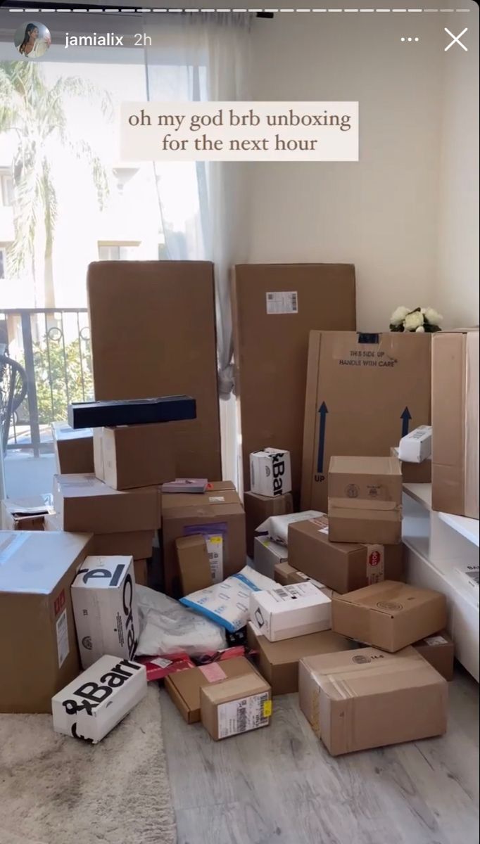 there are many boxes stacked on the floor