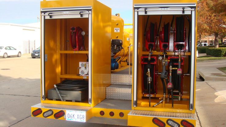 two yellow portable toilets sitting next to each other