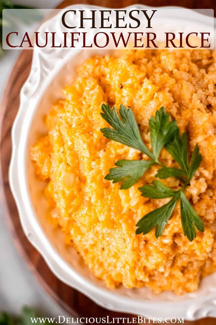 cheesy cauliflower rice in a white bowl with parsley on top